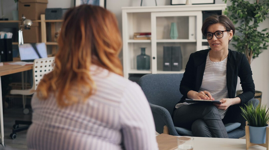woman speaking in interview