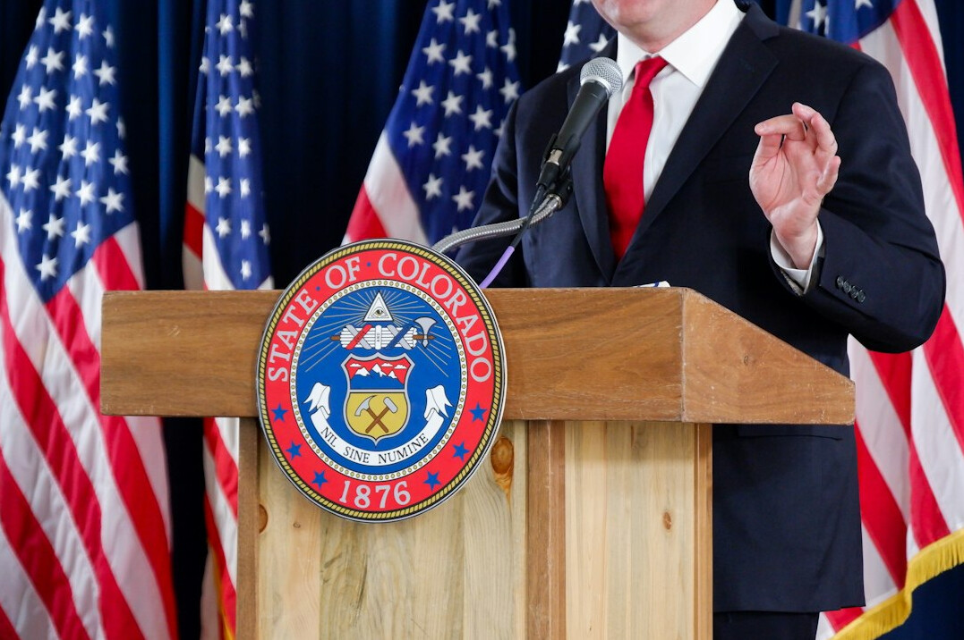 politician at podium speaking